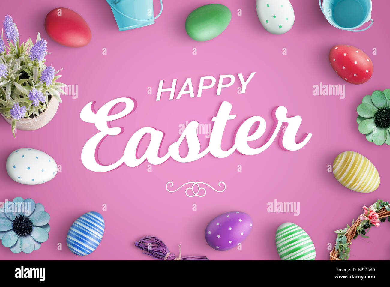 Glat lay happy easter composition with greeting text on pink background. Stock Photo