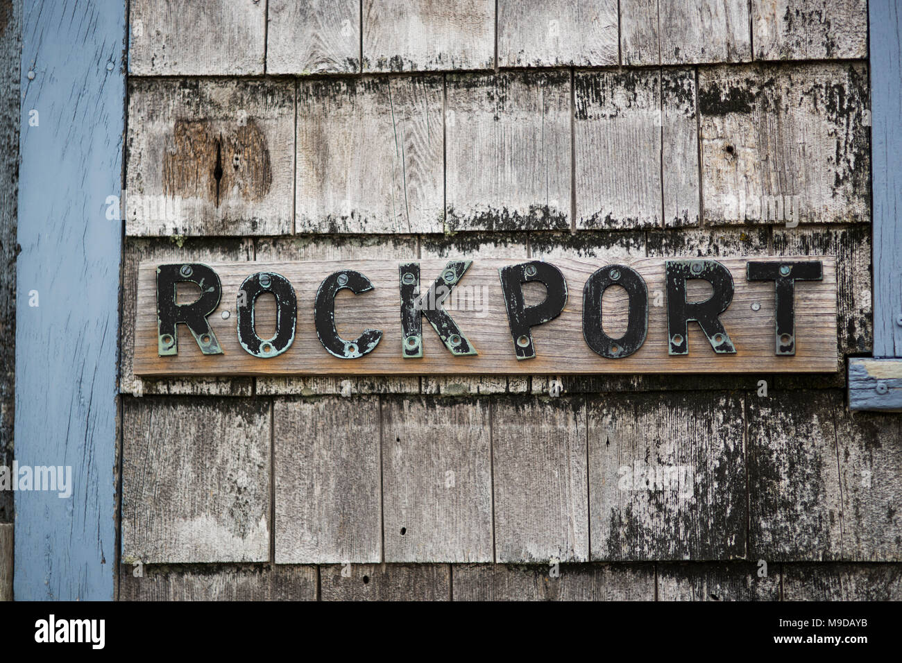 A weathered sign along the coast in Rockport, Massachusetts. Stock Photo