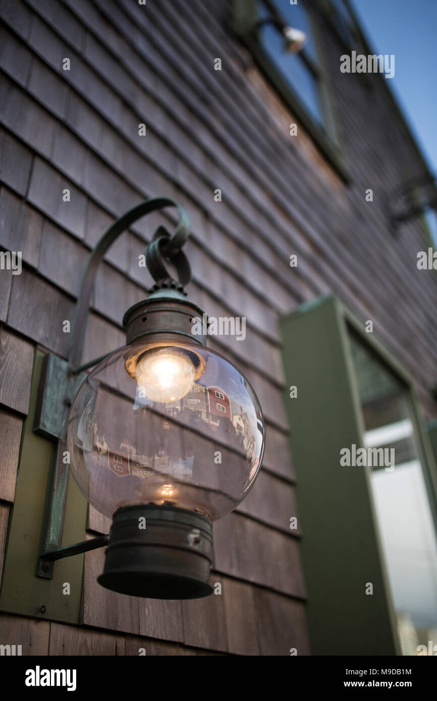 A glass globe lamp outside a shop in Rockport, Massachusetts Stock