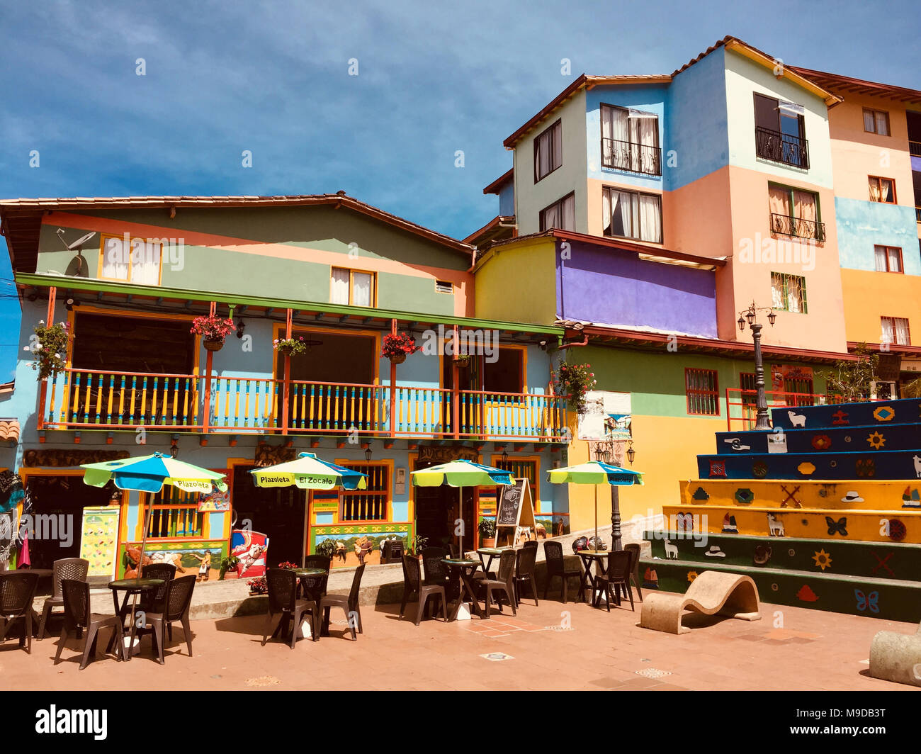 Guatape, Colombia - february 2018: Colorful streets and ornate houses of the city of Guatape near Medellin, Antioquia, Colombia Stock Photo