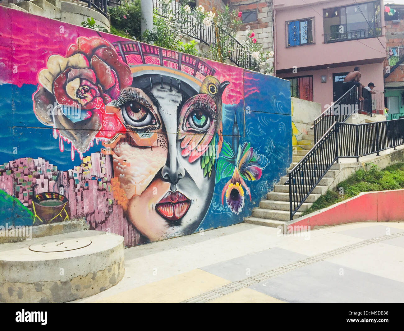 Medellin, Colombia - february 2018:Graffiti mural paintings in the streets of Comuna 13 in Medellin, Colombia. Stock Photo