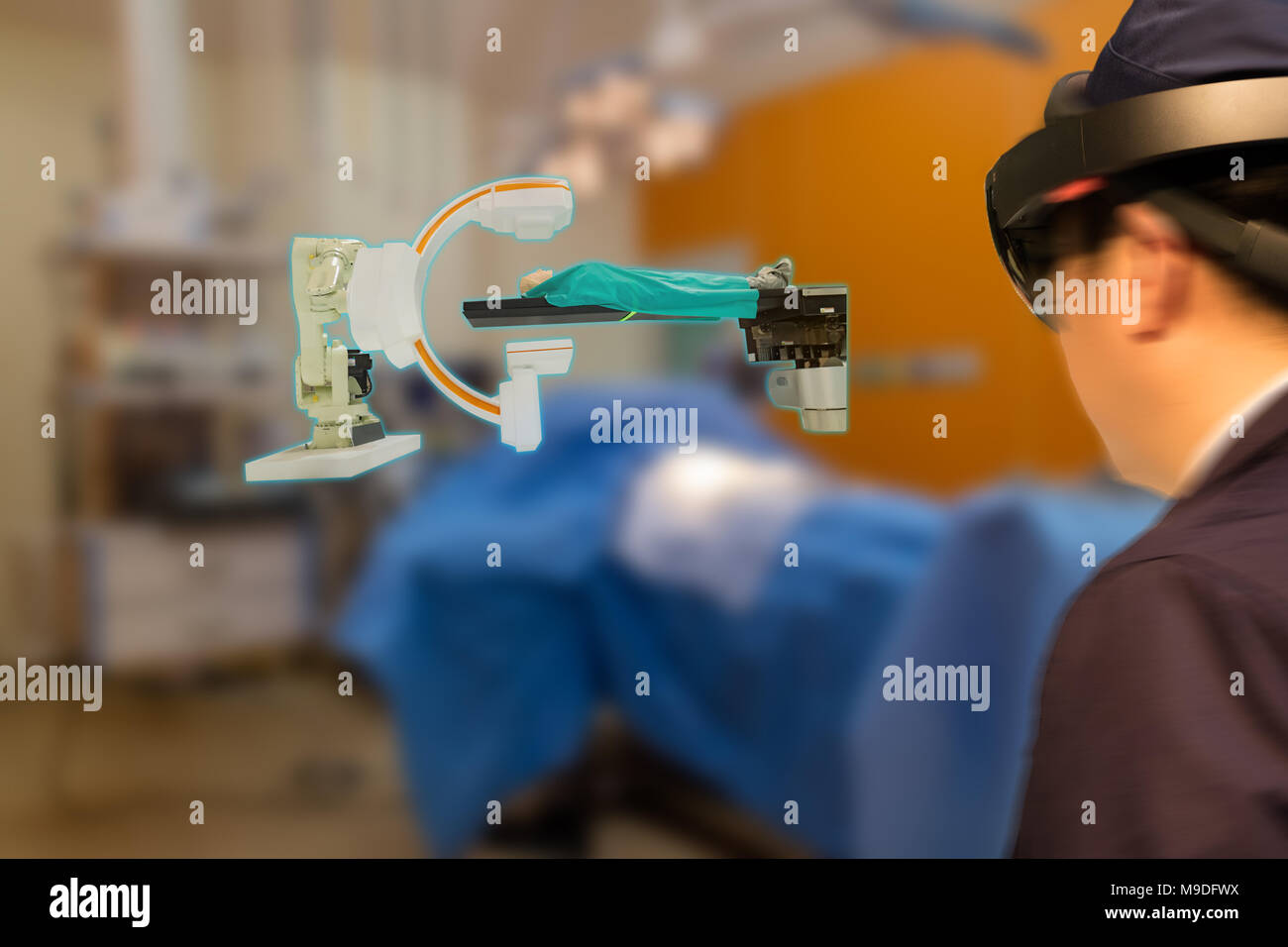 Smart medical technology robot concept, Doctor(blurred) use augmented mixed virtual reality technology in operation room to see the autonomous robotic Stock Photo