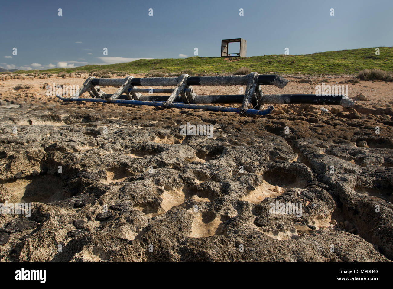 Large piece of plastic debris, environmental pollution,  covered in barnacles washed ashore on the kato paphos beach in cyprus, europe, mediterranean Stock Photo