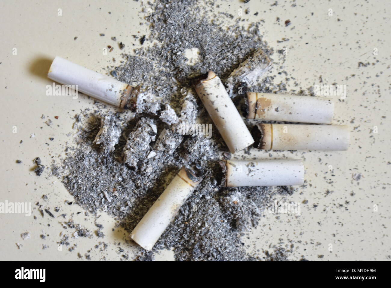 A lot of cigarette piece with ash after smoking shattered on the floor Stock Photo Alamy