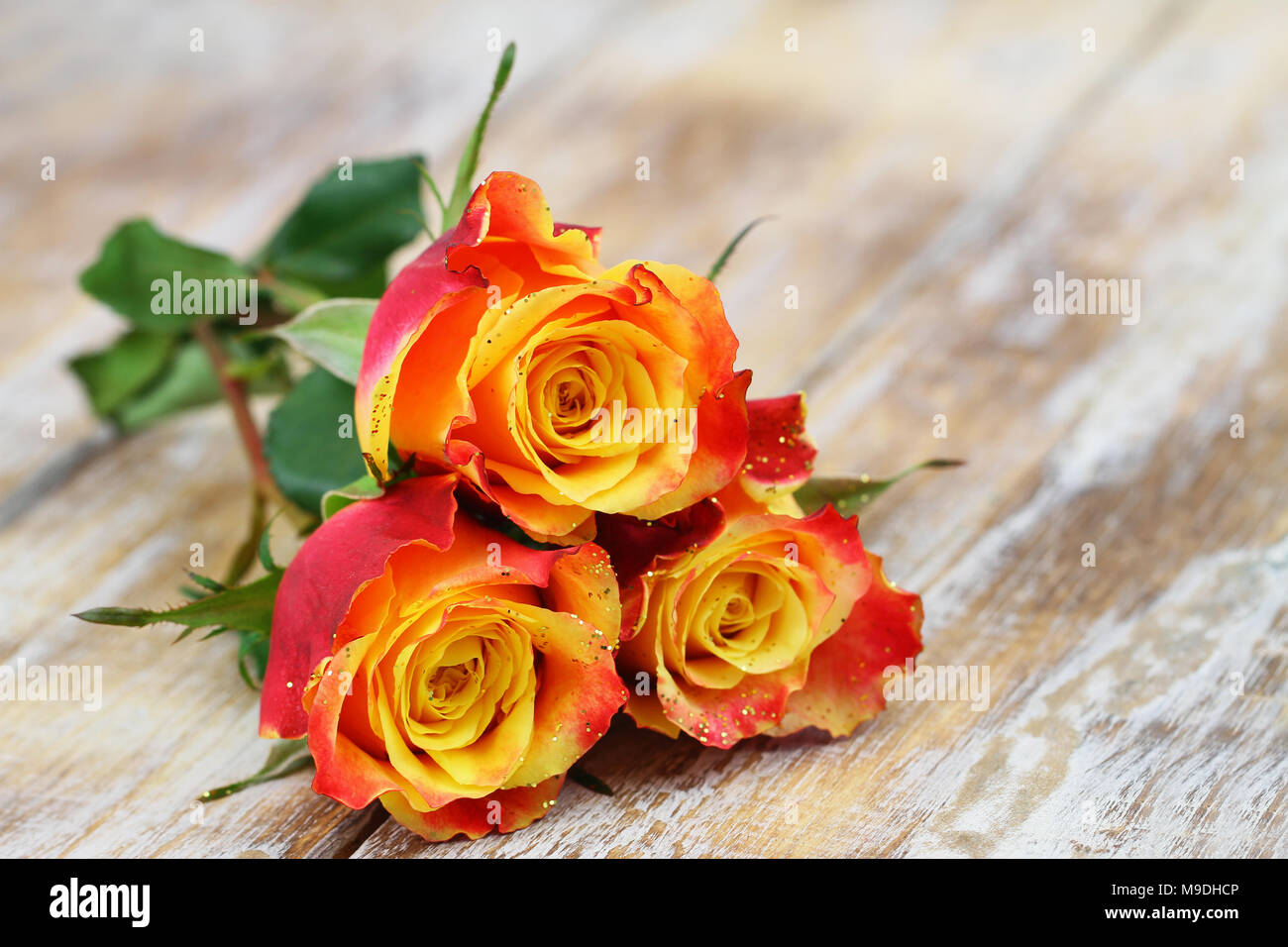 Bouquet yellow orange roses hi-res stock photography and images - Alamy