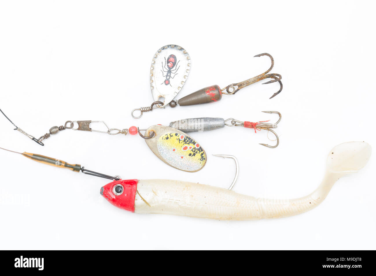Fishing lures found magnet fishing, which involves tying a powerful magnet to a rope, throwing it into lakes or canals and dragging it back-and seeing Stock Photo