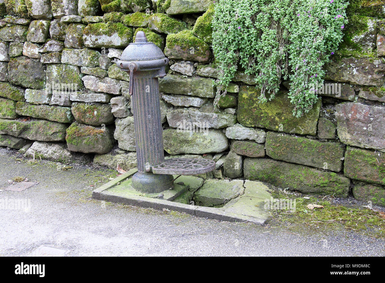 Historic village water pump at Elton near Winster in the Peak District Stock Photo