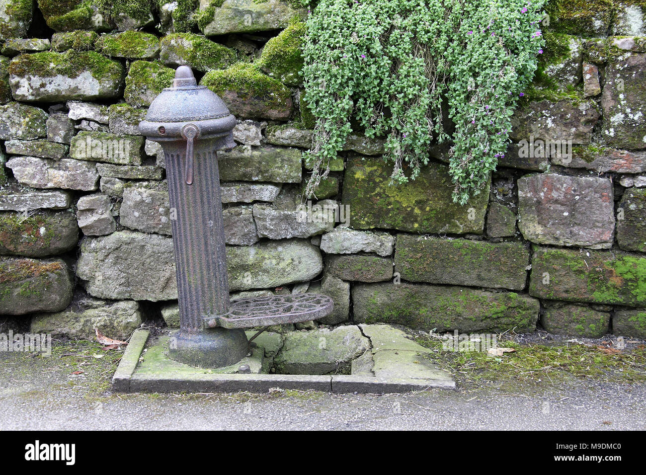 Historic village water pump at Elton near Winster in the Peak District Stock Photo