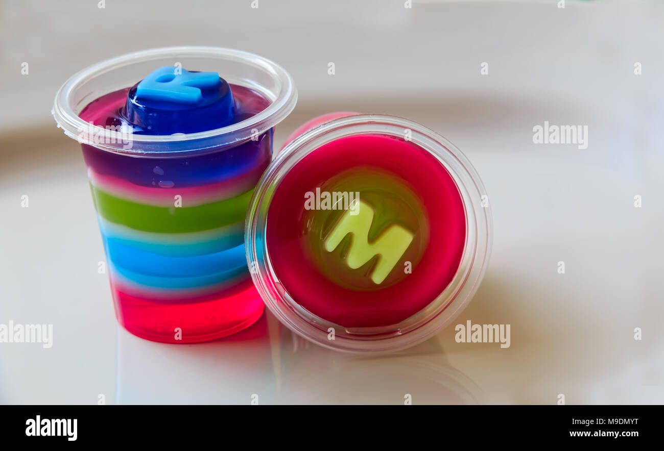 Colorful jelly in plastic cups Stock Photo - Alamy