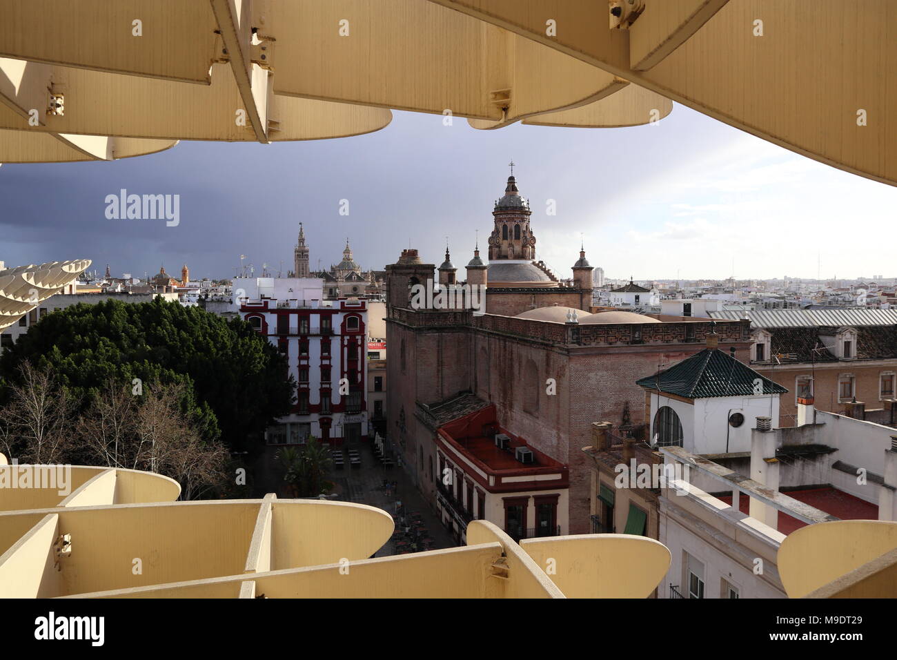 View from Metropol Parasol, Seville city skyline, Cathedral and Giralda, dramatic sky, spain city break Stock Photo