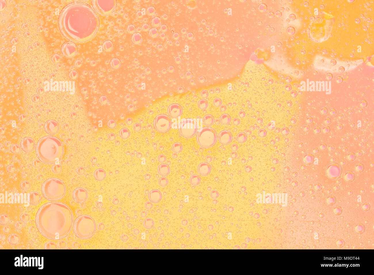 Yellow bubbles background with colors Stock Photo - Alamy