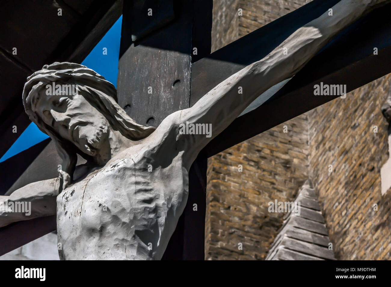 Jesus Christ on cross sculpture at St George's Cathedral the Roman Catholic church designed by Augustus Pugin in Southwark, London Stock Photo