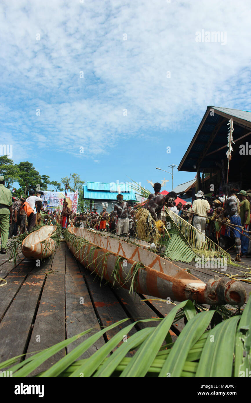 Boat Maneuver at Cultural Festival Asmat, Papua, Indonesia Stock Photo