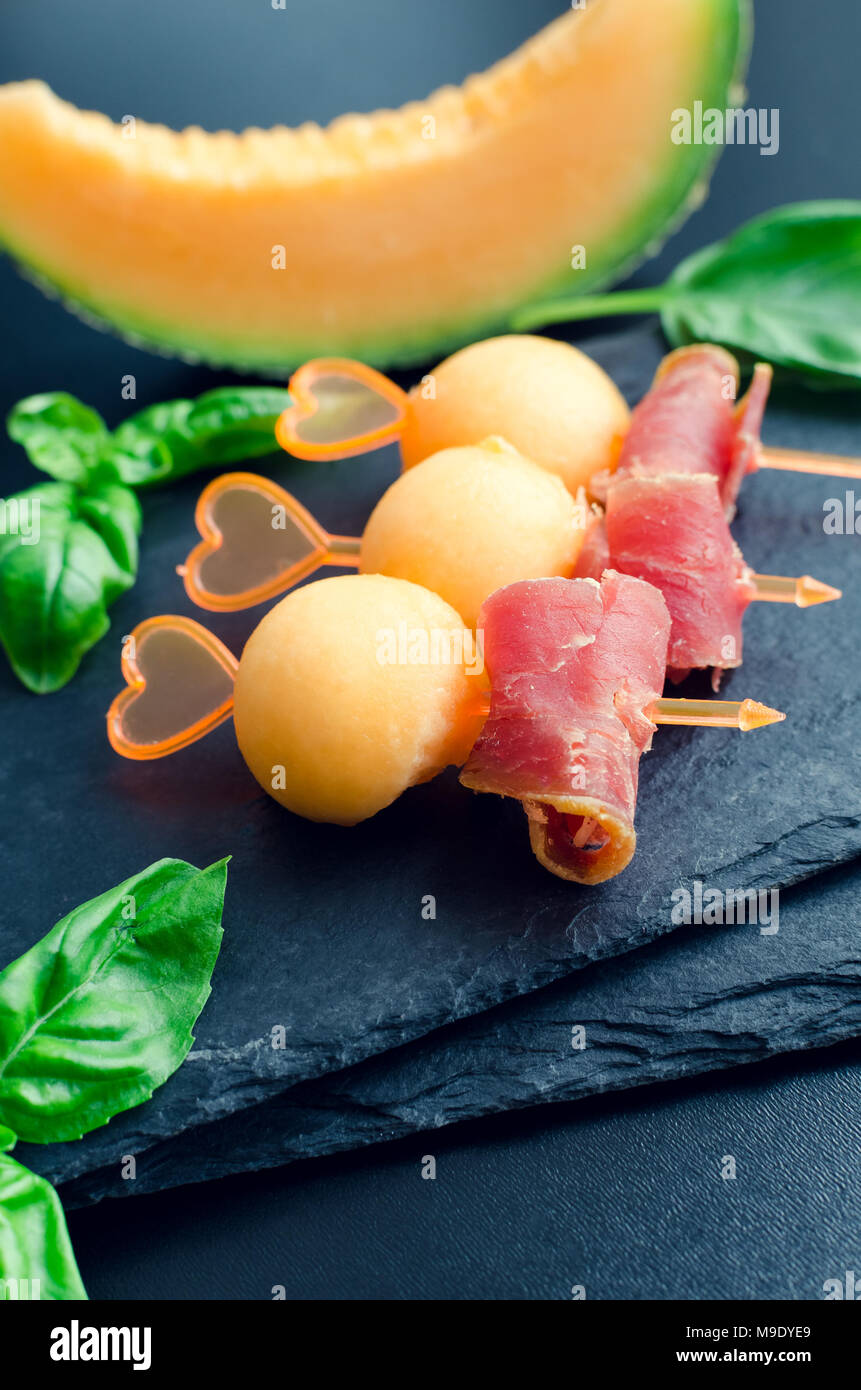 Parma Ham And A Slice Of Melon High Resolution Stock Photography and