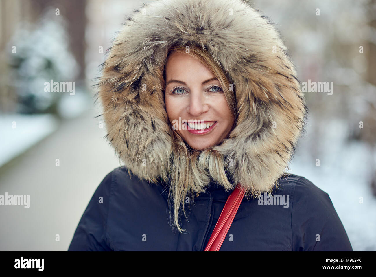 Woman wearing winter jacket hi-res stock photography and images - Alamy