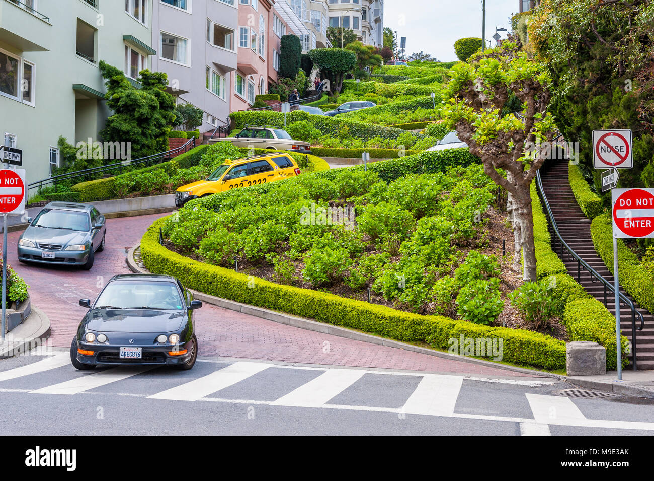 Lombard Street in San Francisco, California, USA, famous for its steep, one-block section with eight hairpin turns Stock Photo
