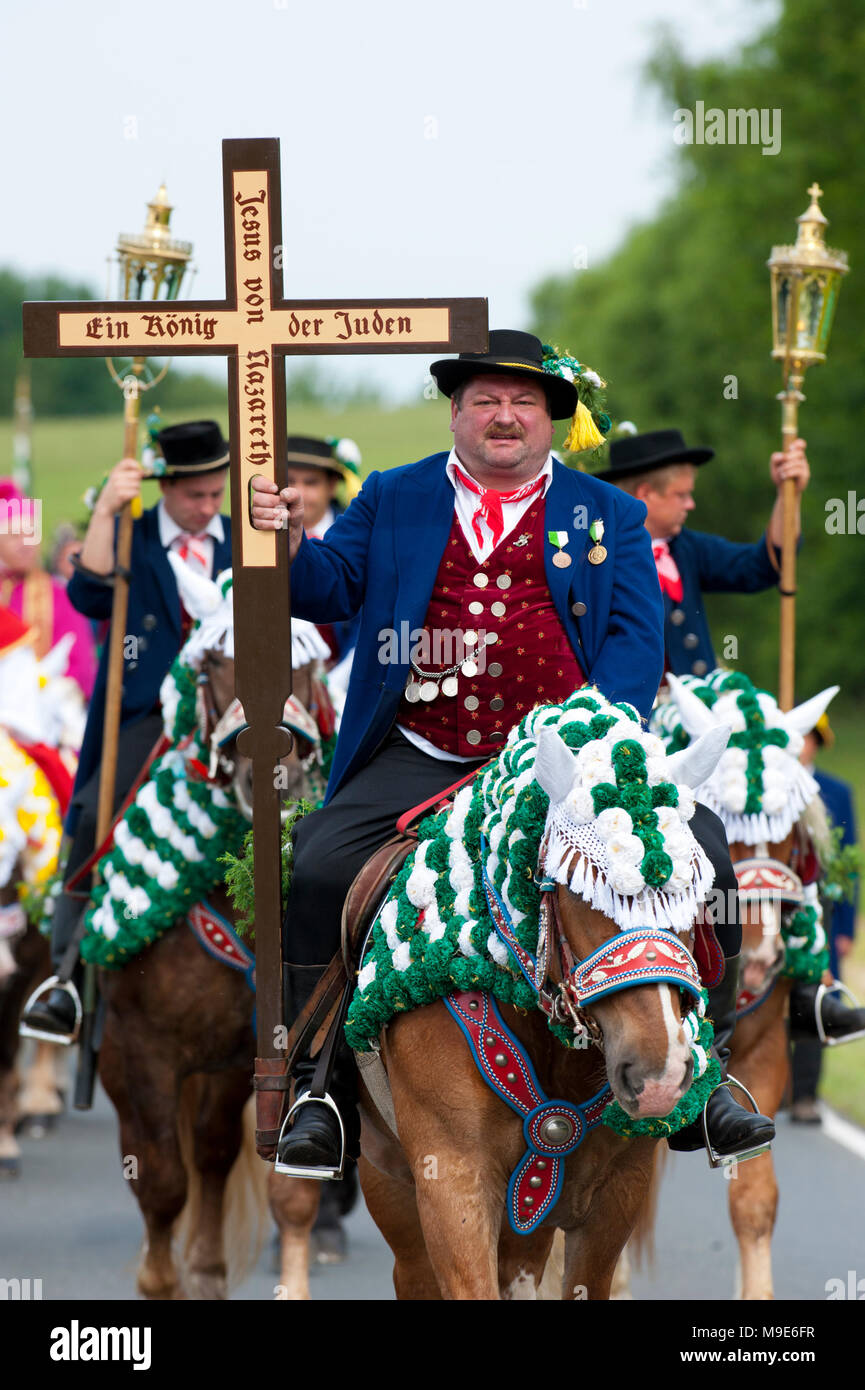 every year at Whitsun a catholic horse procession with many riders in traditional costume takes place in Kötzting, Bavaria, Germany Stock Photo