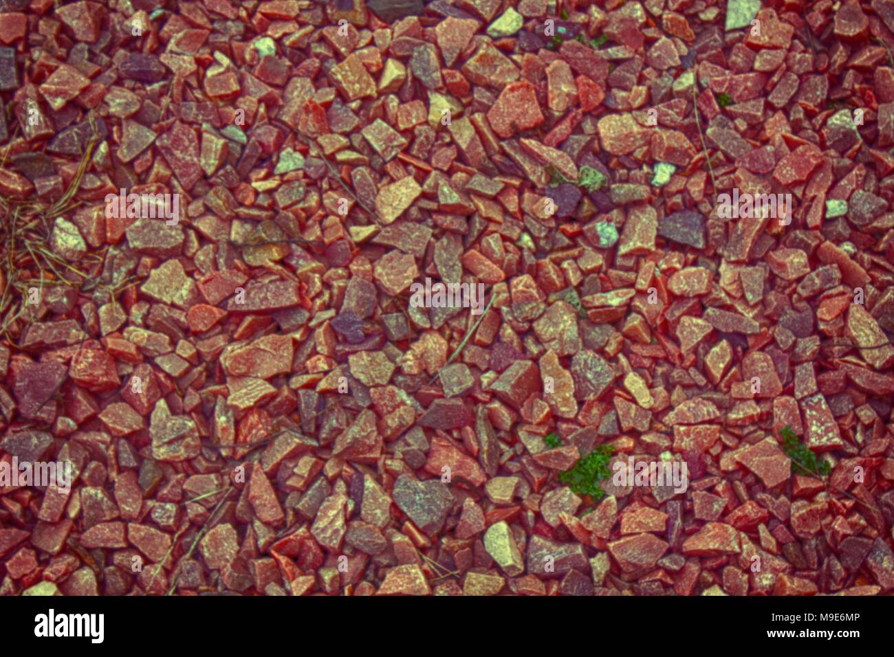 Flintstone pebbles structure of red stone for background. Stock Photo