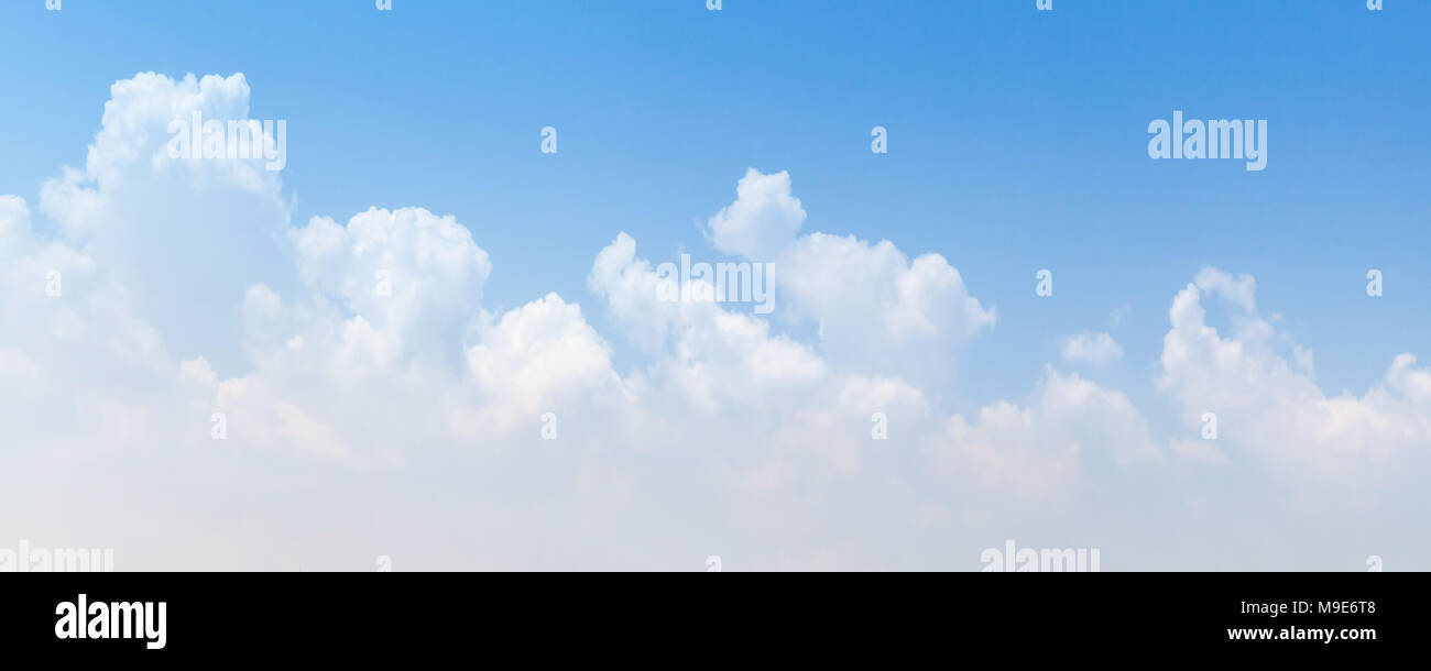 Wide blue sky panoramic background, white cumulus clouds Stock Photo ...