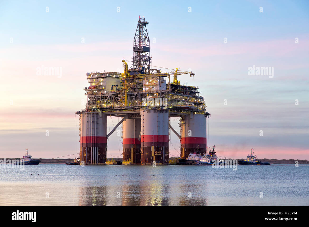 'Big Foot'  Chevron's Deep Ocean Platform departs Kiewit Industries at sunrise, January 30, 2018. Stock Photo