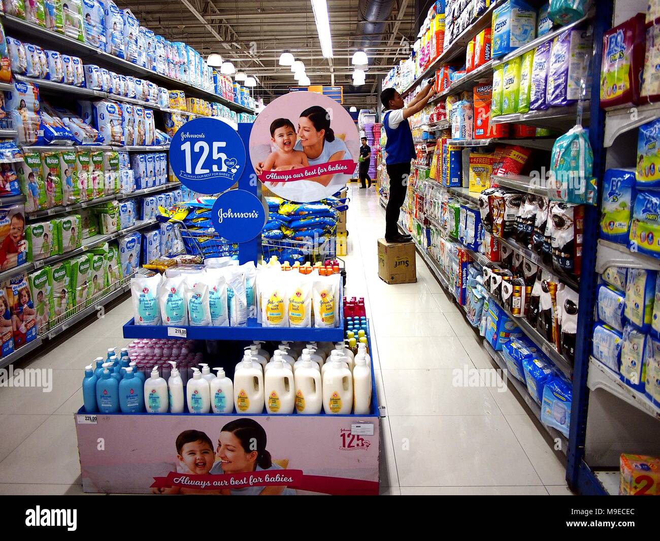 ANTIPOLO CITY, PHILIPPINES MARCH 15, 2018 A grocery employee arrange