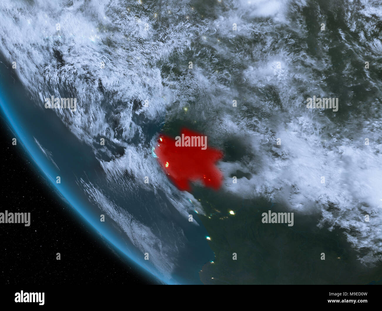Gabon at night highlighted in red on planet Earth with clouds. 3D ...