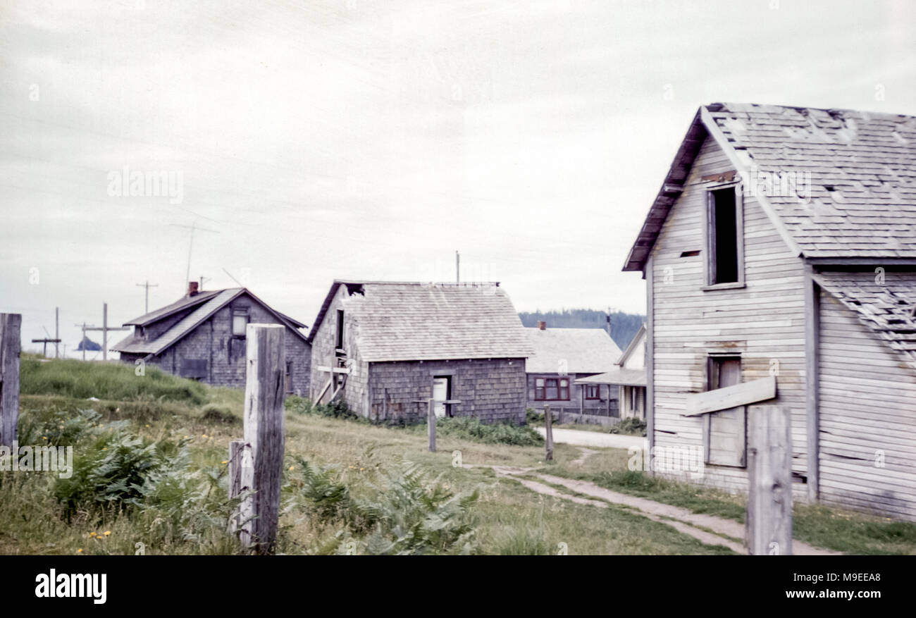 Ruined native American Indian reservation old wooden clapboard houses, Washington state, USA in 1950s Stock Photo