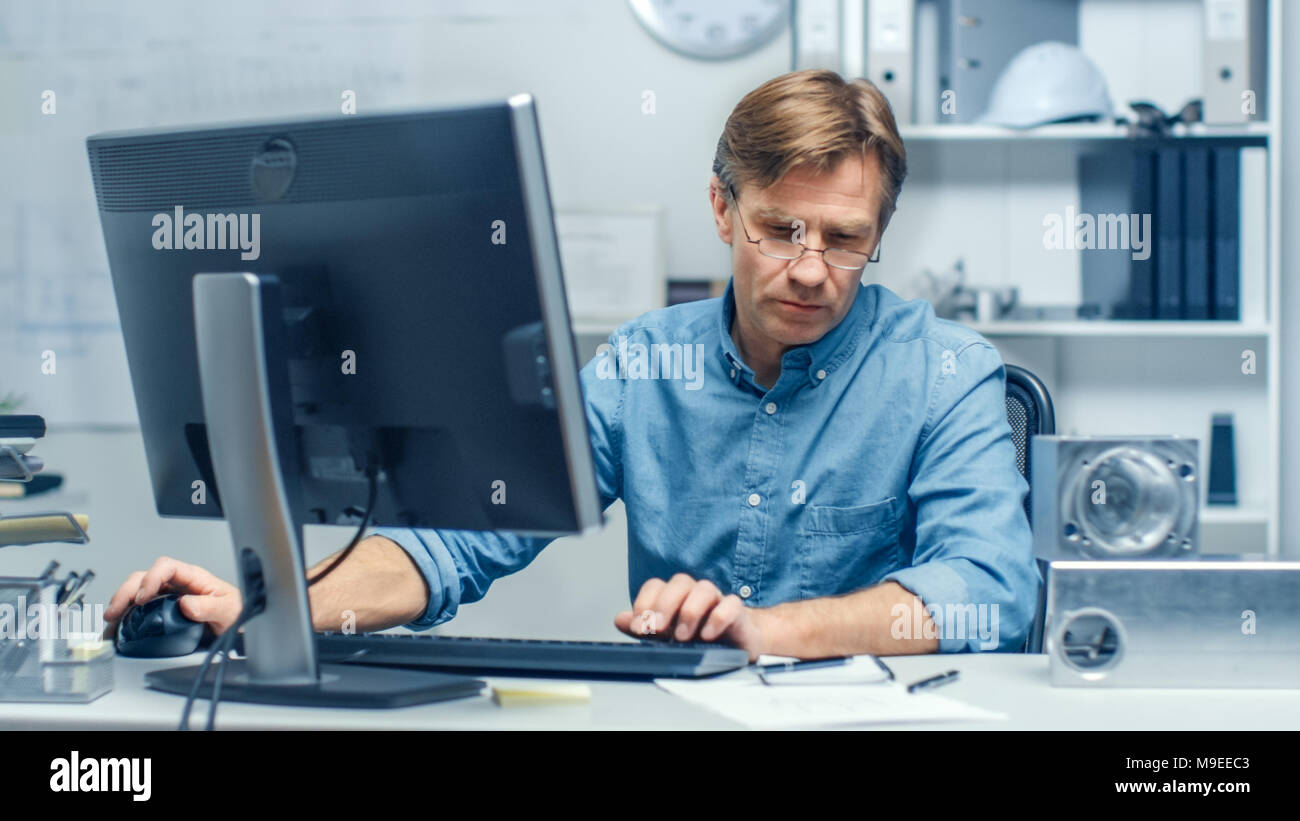 Busy Engineering Bureau. Chief Engineer Working at His Desk, Some