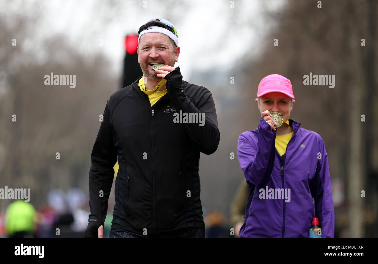 Runners pose with their finisher medals after the 2018 London Landmarks Half Marathon. PRESS ASSOCIATION Photo. Picture date: Sunday March 25, 2018. Photo credit should read: Steven Paston/PA Wire Stock Photo