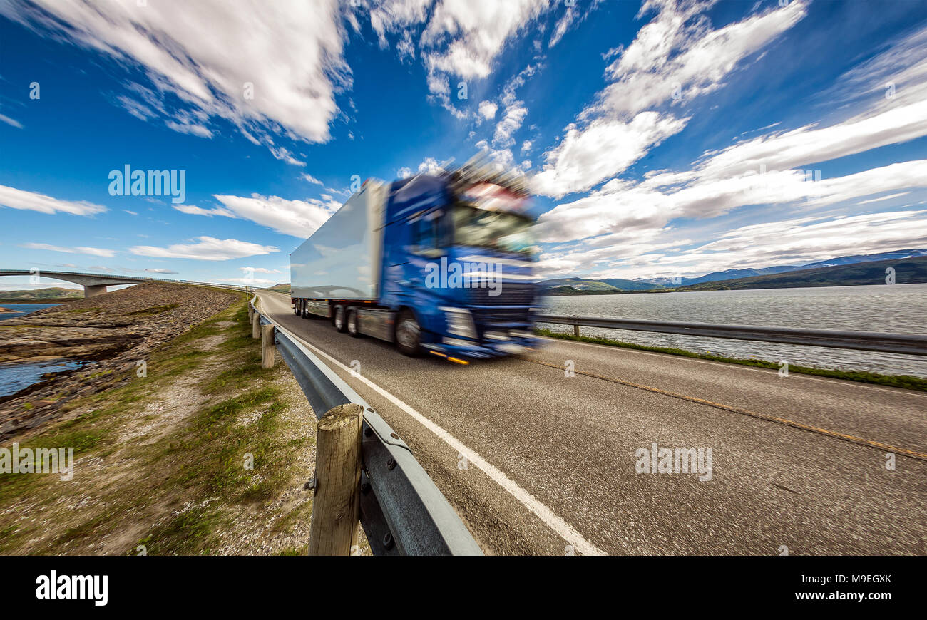 Car driving down atlantic ocean road hires stock photography and