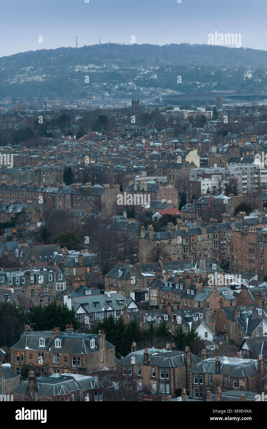 A view from high above Edinburgh in half light with Edinburgh Castle
