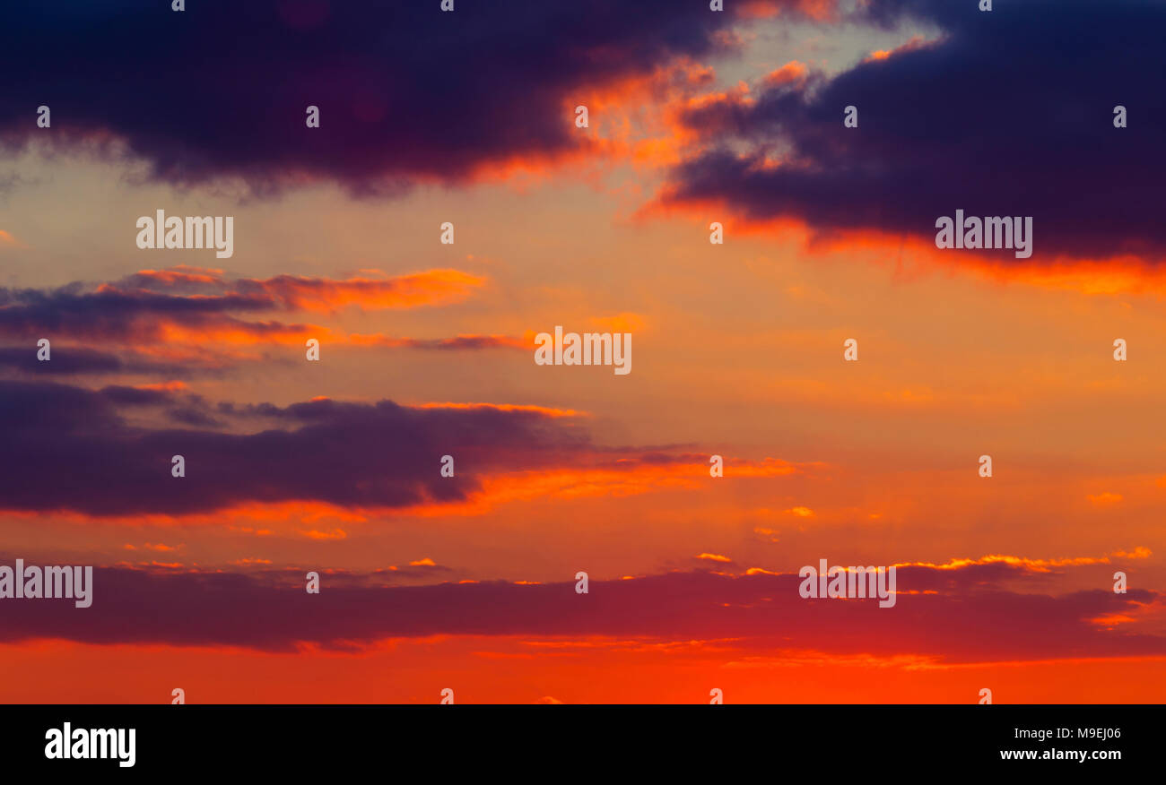 Beautiful sunset with colorful clouds on the sky Stock Photo - Alamy