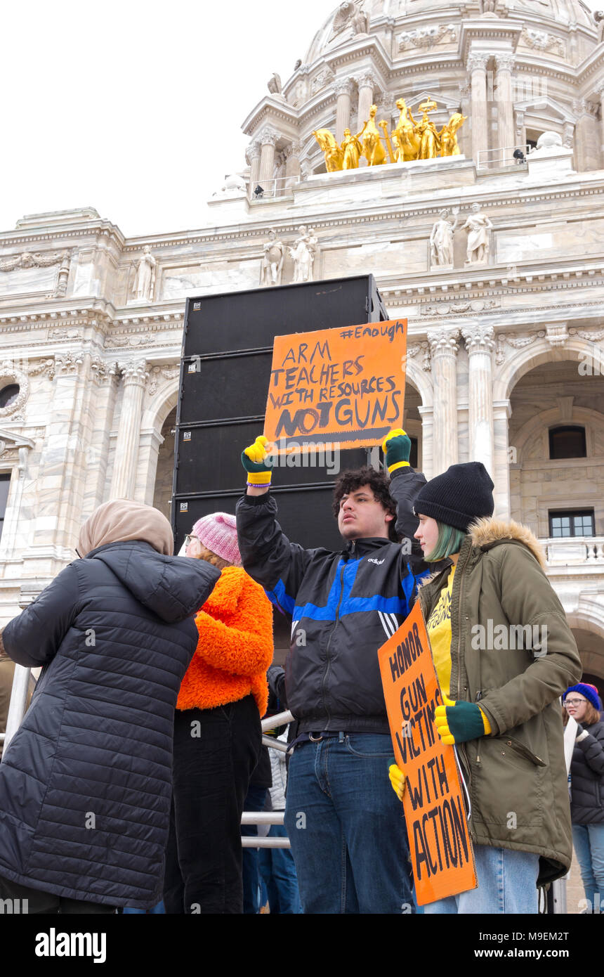 SAINT PAUL, MINNESOTA, USA – MARCH 24, 2018: Students hold up signs during March For Our Lives rally at State Capitol in Saint Paul. Stock Photo