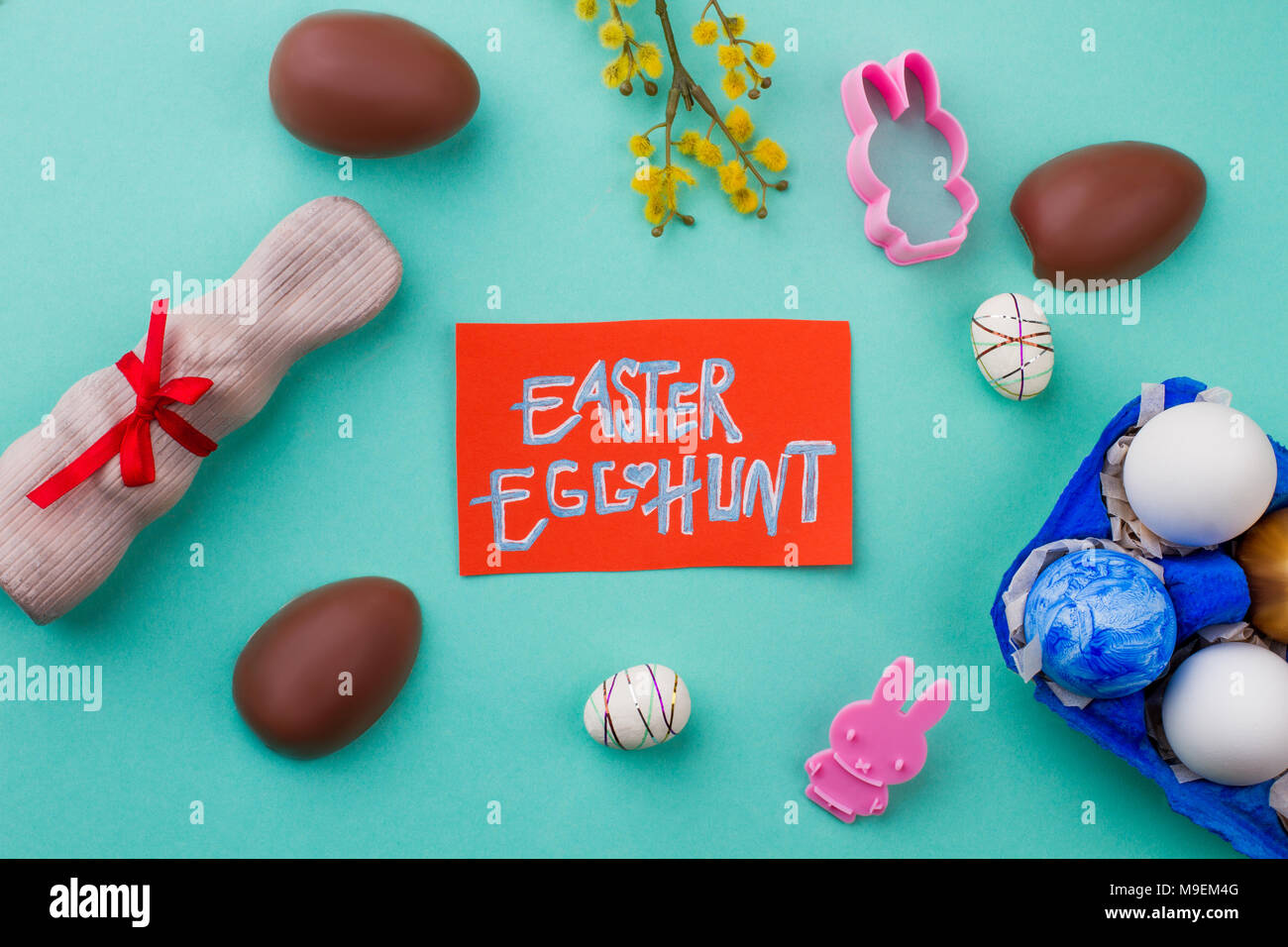 Easter egg hunt concept. Card with text Easter egg hunt, sweets, eggs