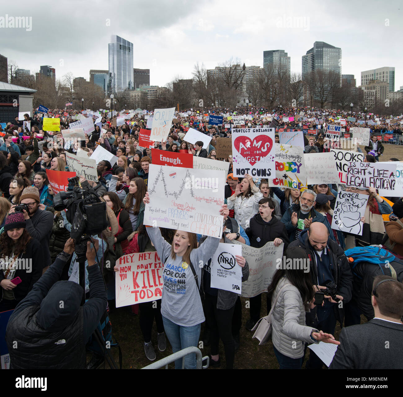 March For Our Lives, Boston, Massachusetts, USA 3-24-2018:  An estimated crowd of over 100,000 People gathered on the Boston Common during the March For Our Lives anti-gun demonstration. March For Our Lives demonstrations took place in most major U.S. cites and around the world on March 24th 2018. March For Our Lives demonstrations were a reaction to the school shooting at Marjory Stoneman Douglas High School on Valentine’s Day of 2018 in Parkland Florida, USA.  The shooting in Florida left 17 high school students dead. Credit: Chuck Nacke / Alamy Live News Stock Photo