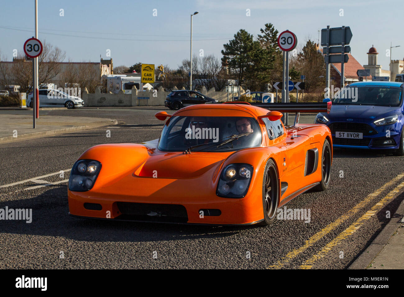 Ultima GTR North-West Supercar event as and tourists arrive in the coastal resort on a warm spring day. Cars are bumper to bumper on the seafront esplanade as classic & vintage car enthusiasts take advantage of warm weather for a motoring day out. Stock Photo