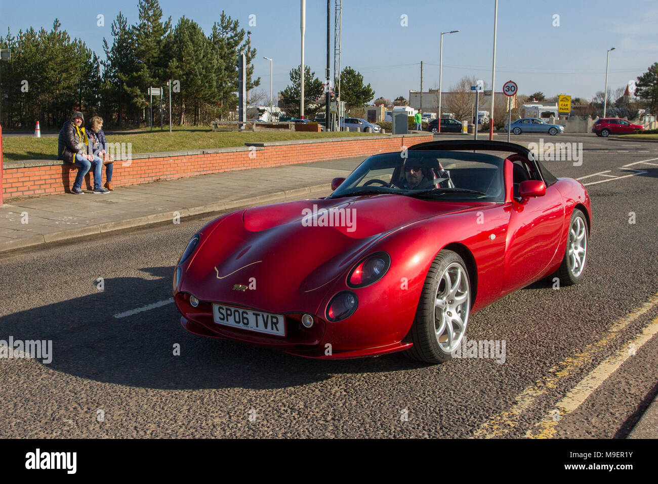2006 red TVR Tuscan 4500cc petrol roadster at the North-West Supercar event as cars and tourists arrive in the coastal resort on a warm spring day. Stock Photo