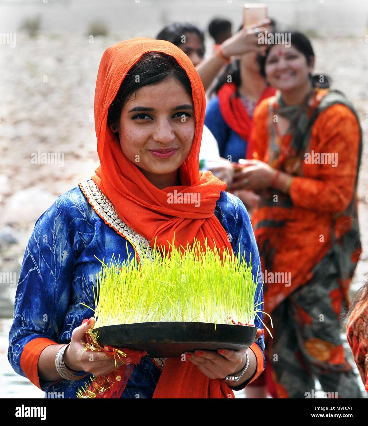 Jammu, Hindu festival in Jammu. 25th Mar, 2018. A Hindu devotee carries a 