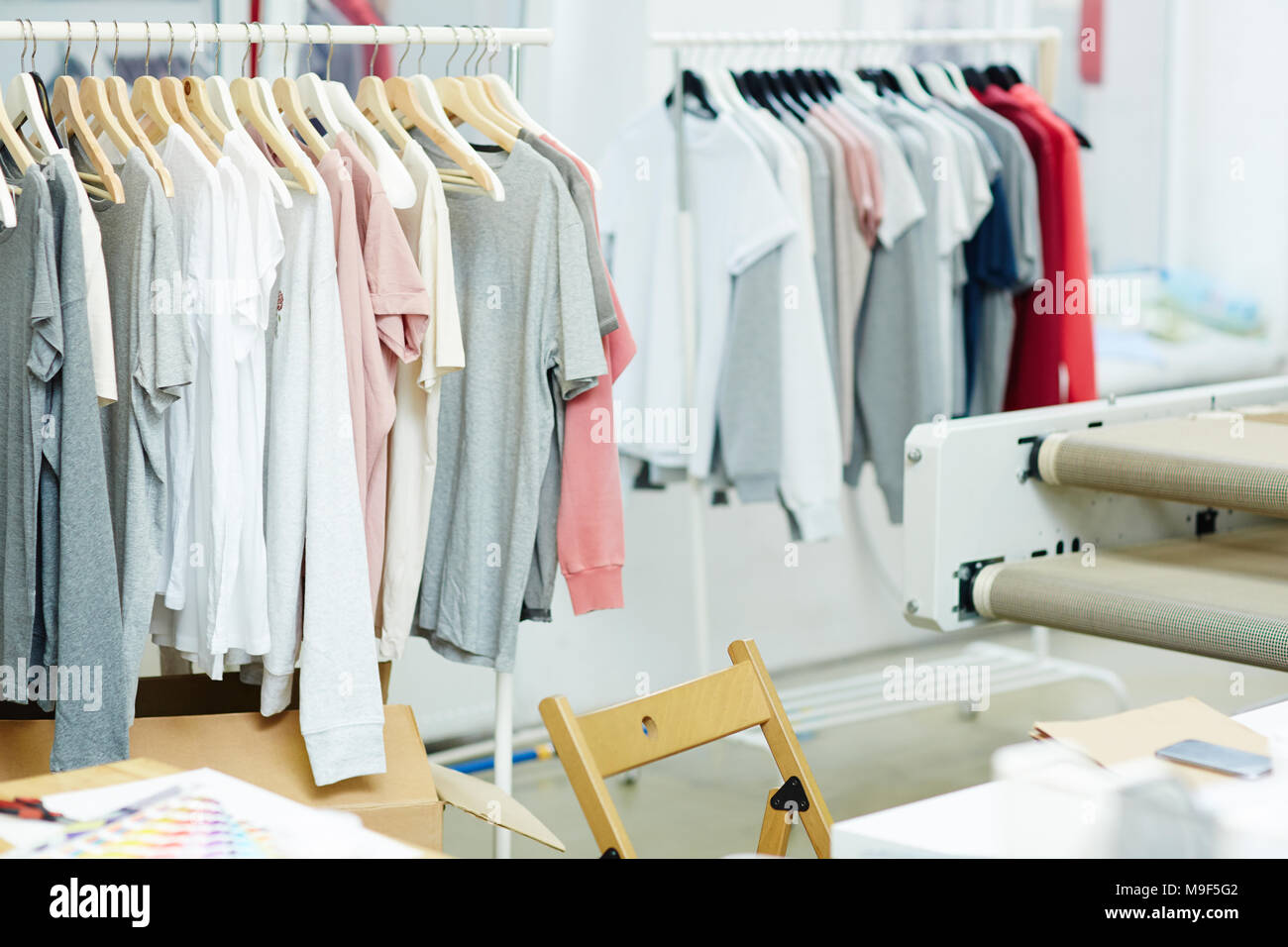Women dresses new collection of stylish clothes wear hanging on hangers Stock Photo