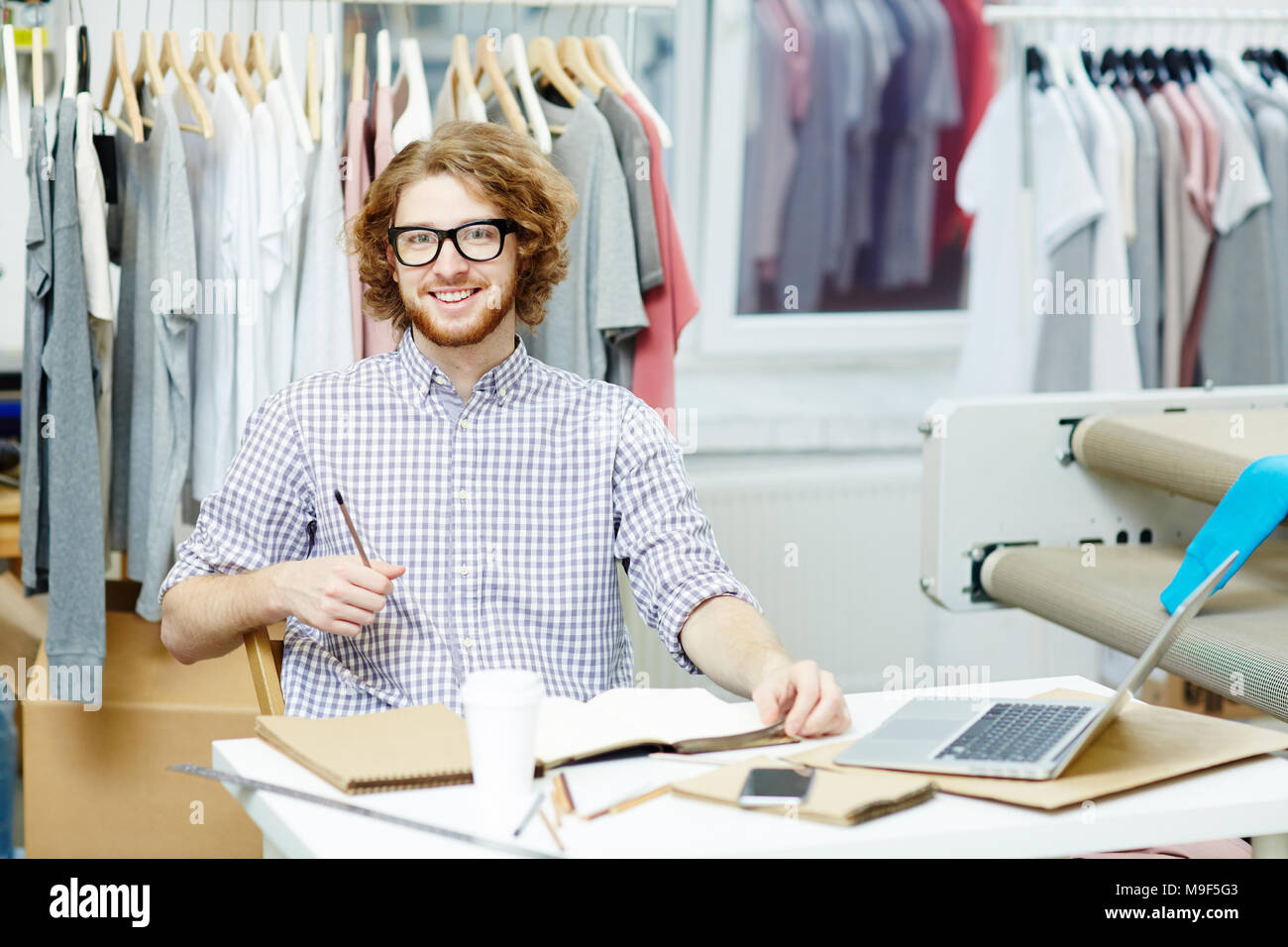 The young designer thinking about a new collection Stock Photo