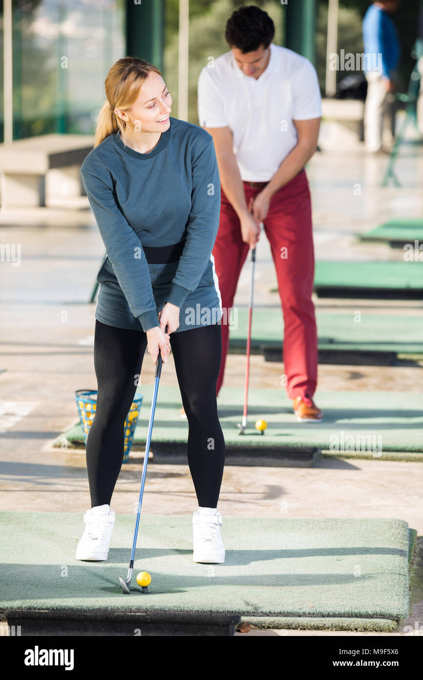 Man 30 35 Years Old Are Woman 25 29 Years Old Golf Players Are Enjoying Game At Golf Course