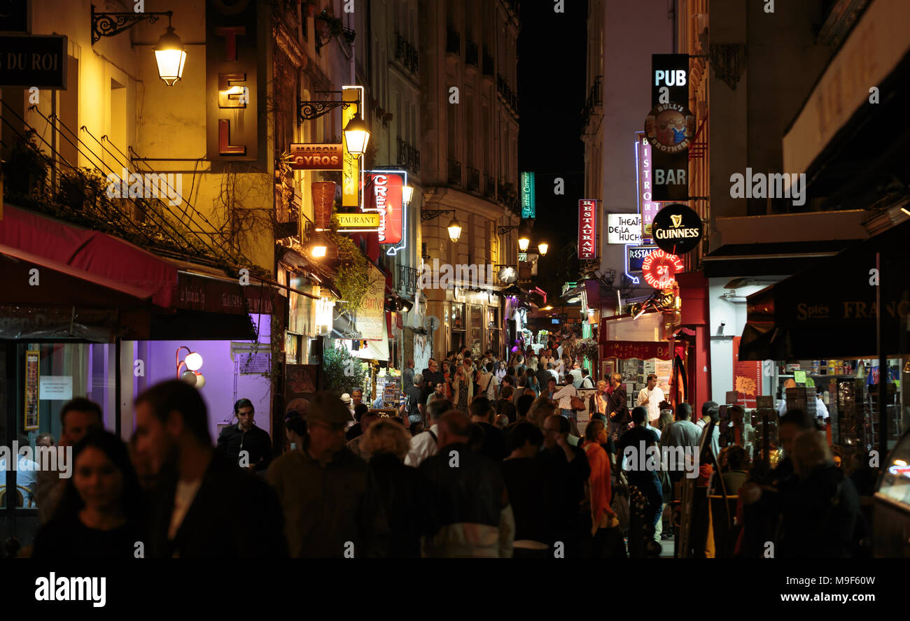 Latin Quarter of Paris, France. Narrow street of Paris among old traditional parisian houses and