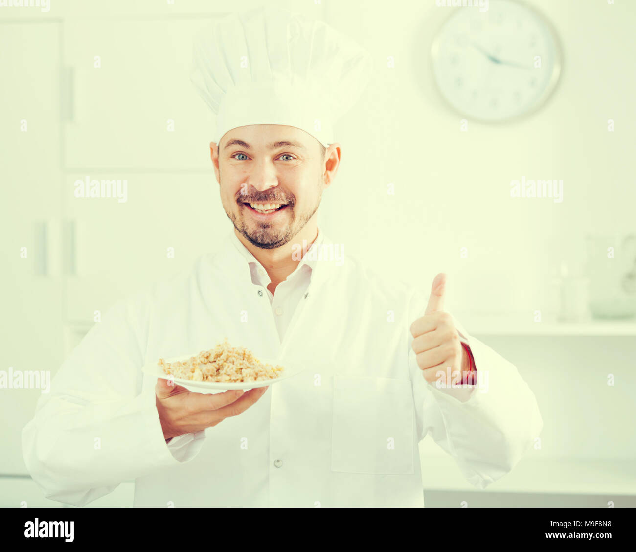European Cook Young happy european cook hi-res stock photography and images - Alamy