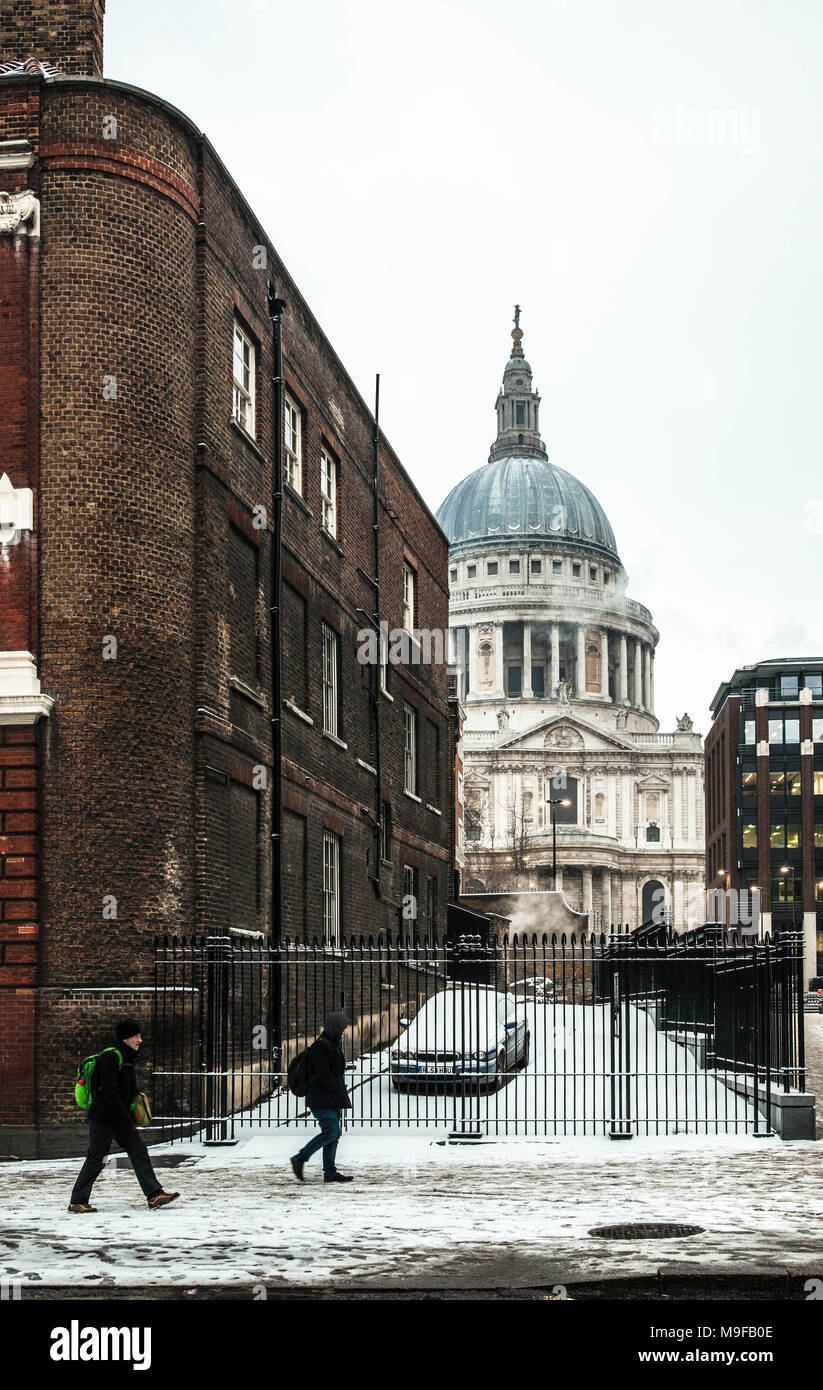St. Paul's Cathedral seen from Queen Victoria Street, on a snowy morning, London, EC2, England, UK. Stock Photo