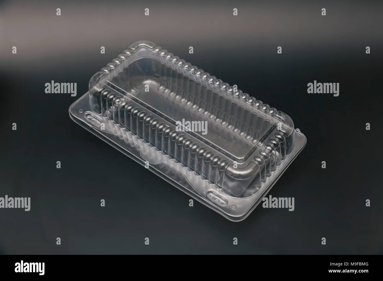 plastic container for food, on black Stock Photo