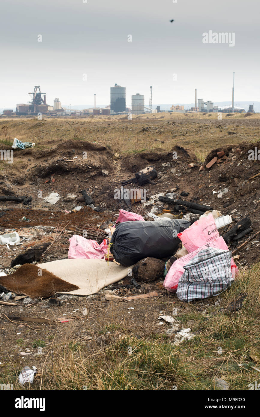 Fly tipping on industrial wasteland, South Gare, Redcar, Teesside. UK Stock Photo