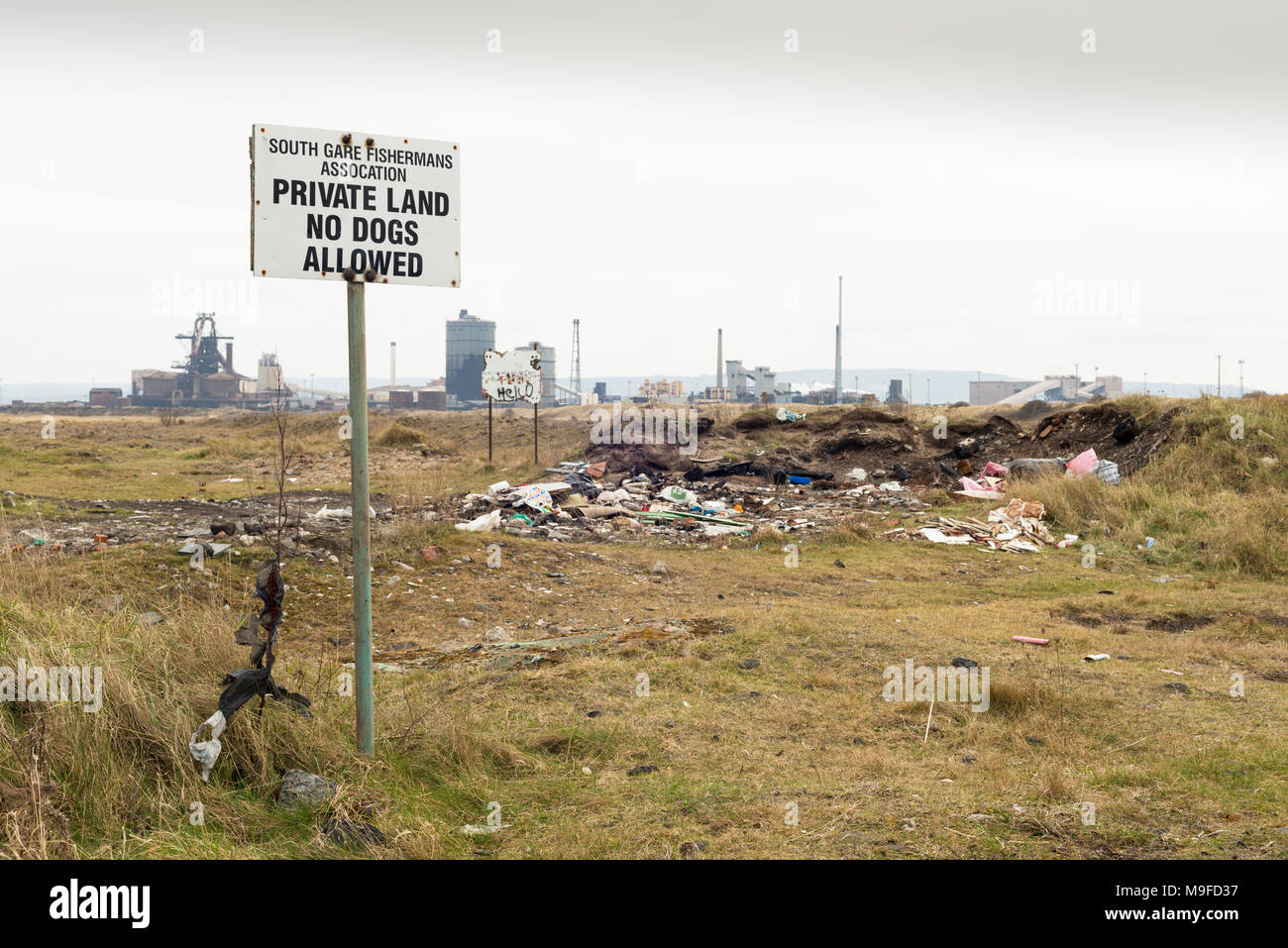 Fly tipping on industrial wasteland, South Gare, Redcar, Teesside. UK Stock Photo