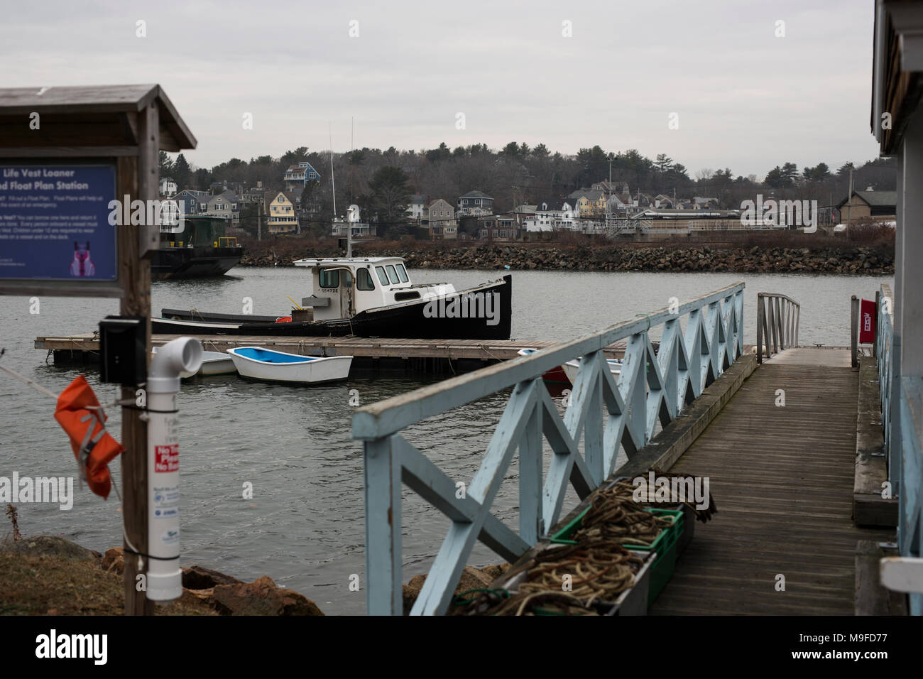 A boat in the dock in the harbor of Manchester-by-the-Sea, Massachusetts. Stock Photo