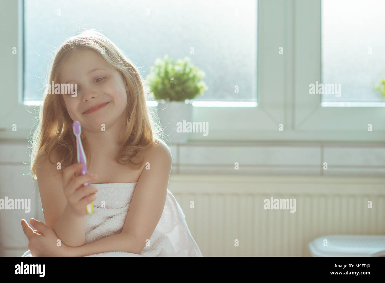 one girl is bathing