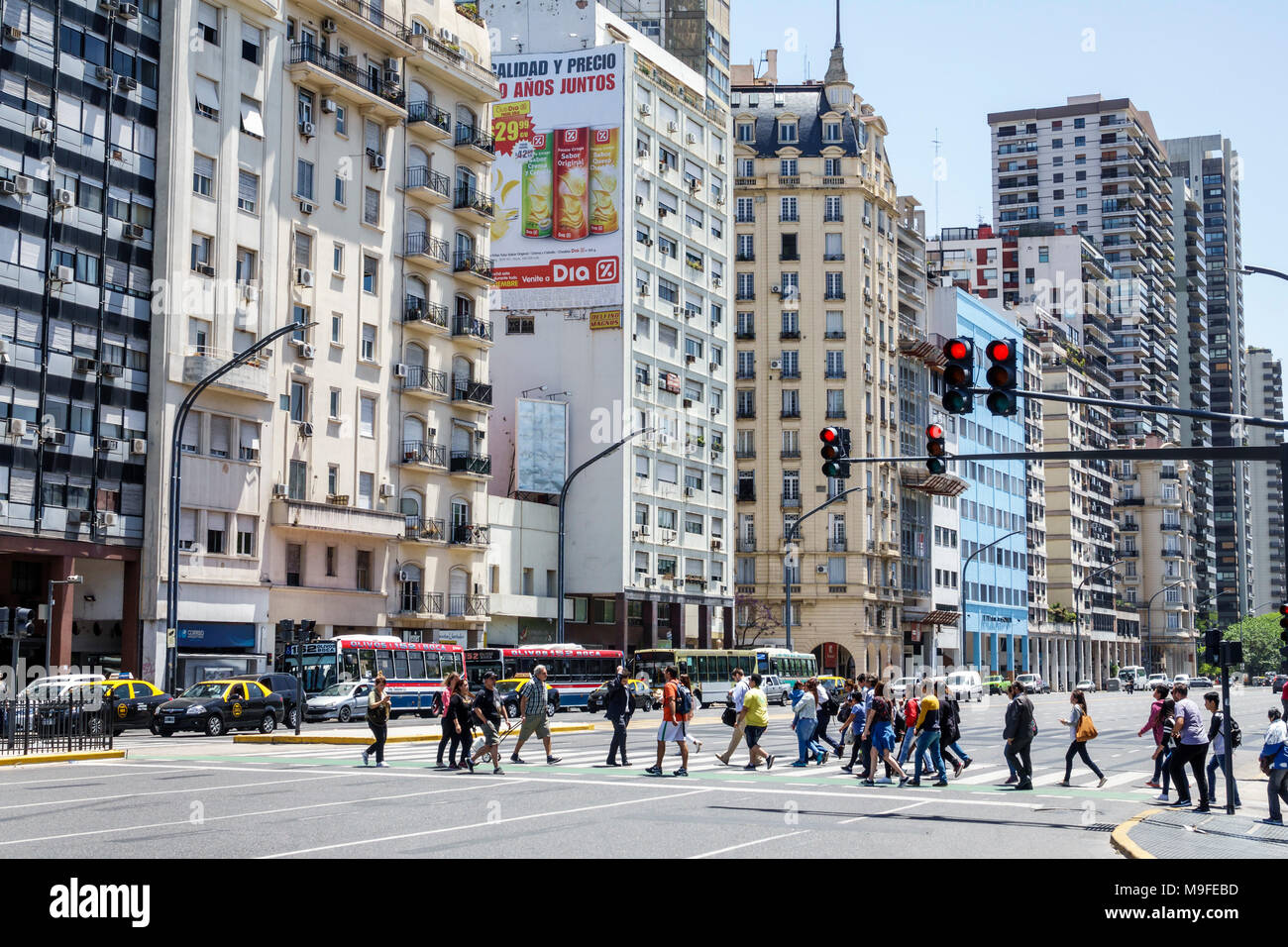 Buenos Aires Argentina,Avenida del Libertador,street scene,buildings,pedestrians,crossing,red light,taxi,bus,Hispanic,ARG171128156 Stock Photo